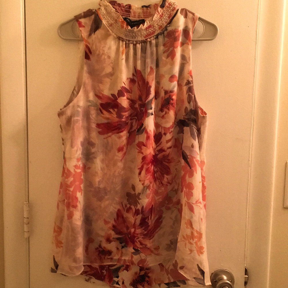 White House Black Market sleeveless blouse.